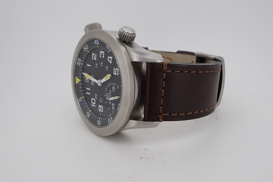 A gentleman's recent stainless steel Victorinox Swiss Army stainless steel manual wind wrist watch with black Arabic dial and subsidiary seconds, case diameter 45mm, on a brown leather strap, no box or papers.